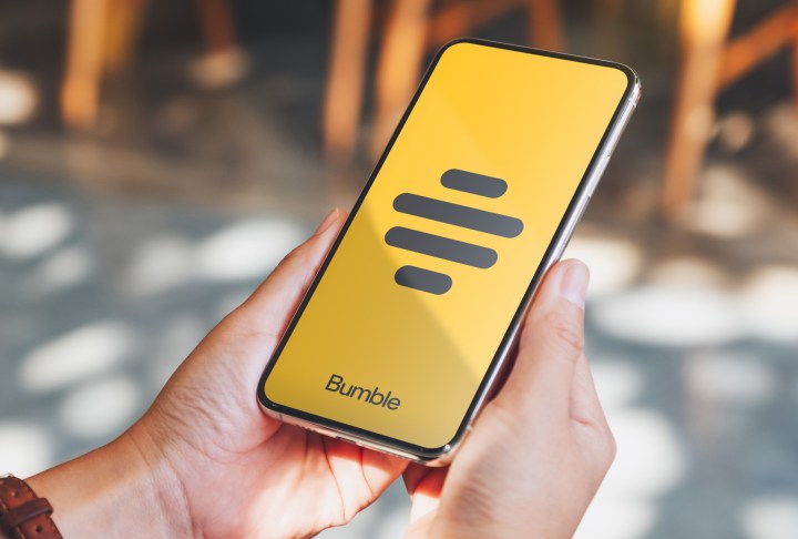 Bumble app logo displayed on a smartphone screen showing the Plans feature interface