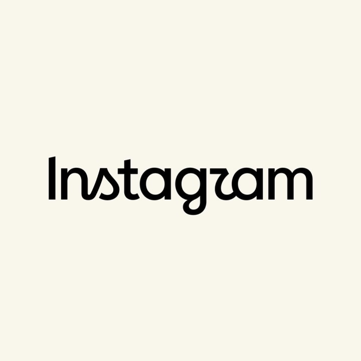 Instagram's new wordmark logo displayed on a smartphone screen